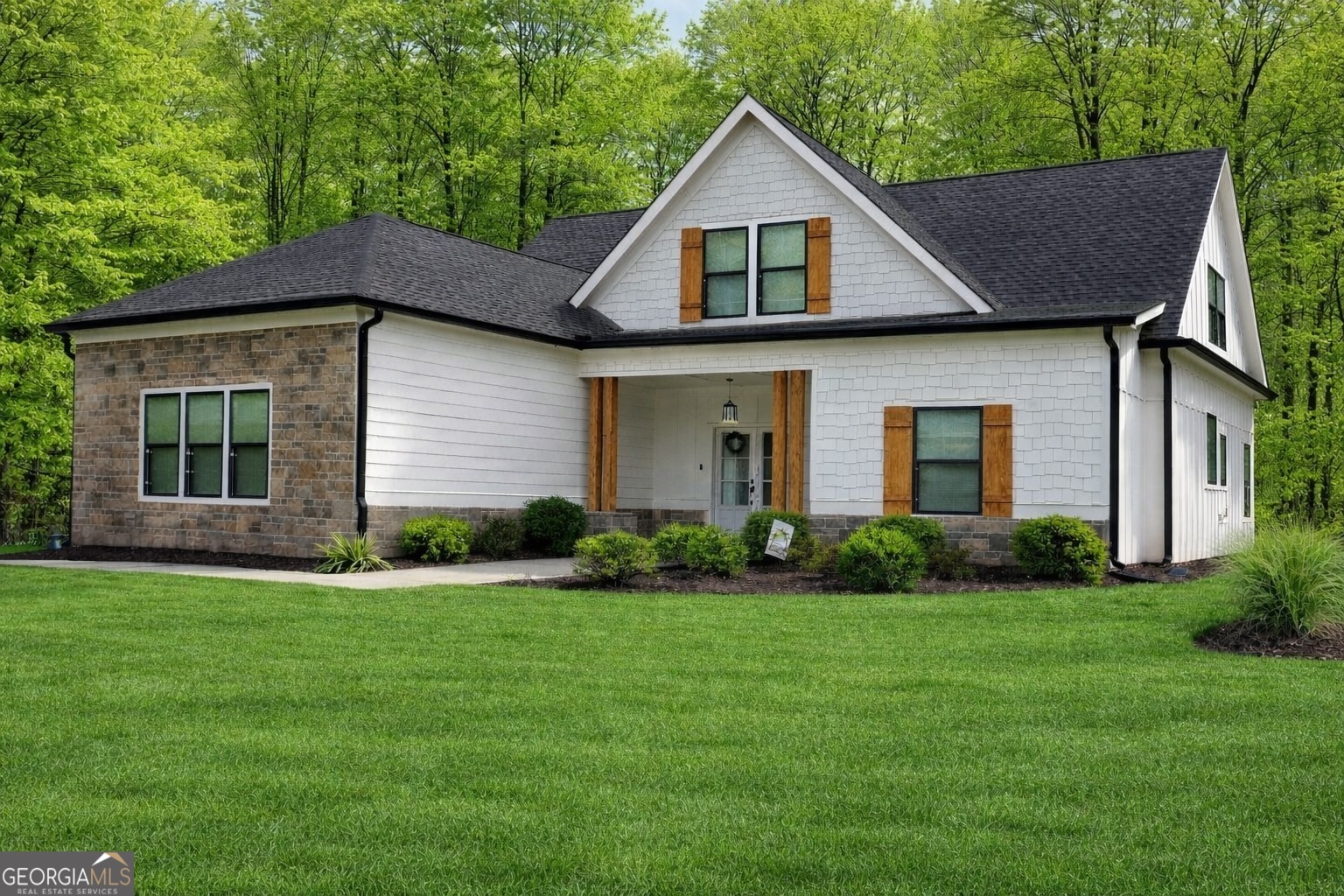 506 Summit View Drive Jefferson, GA 30549 - Photo 4 of 52 a front view of a house with a yard and garage