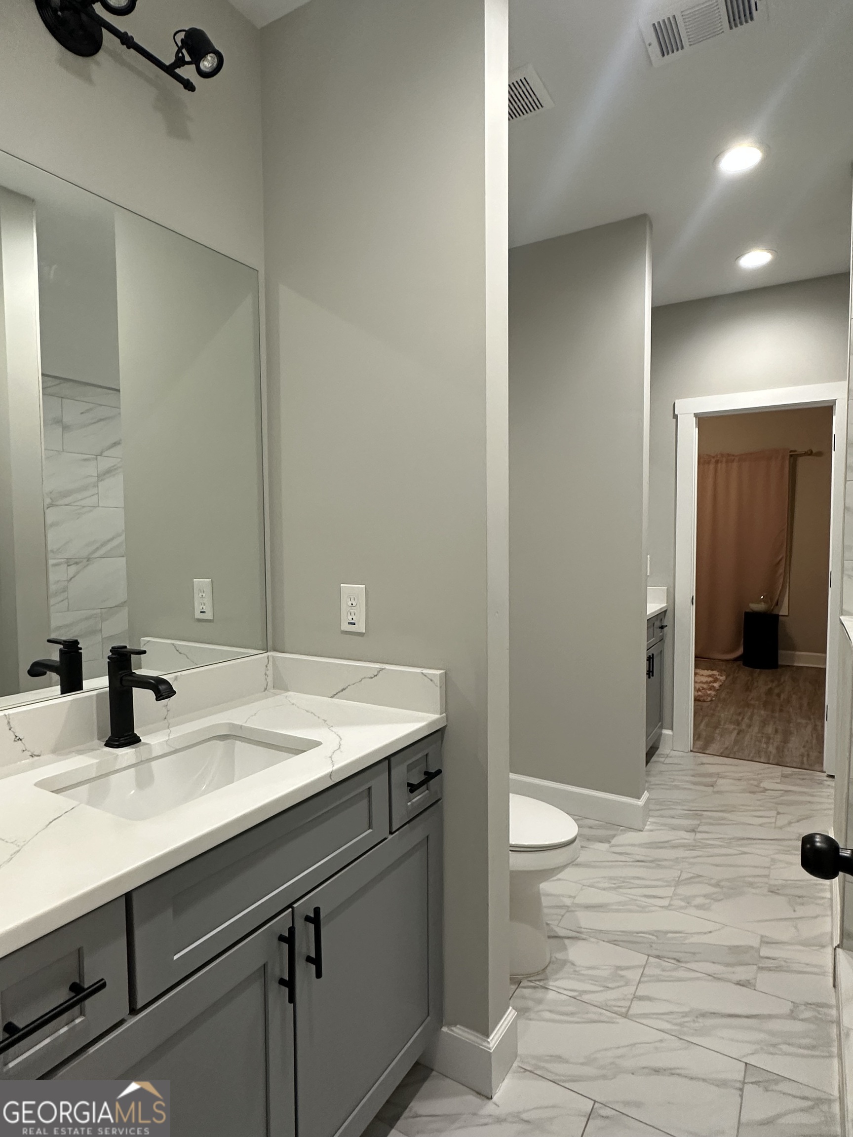 506 Summit View Drive Jefferson, GA 30549 - Photo 42 of 52 a bathroom with a sink a toilet and shower
