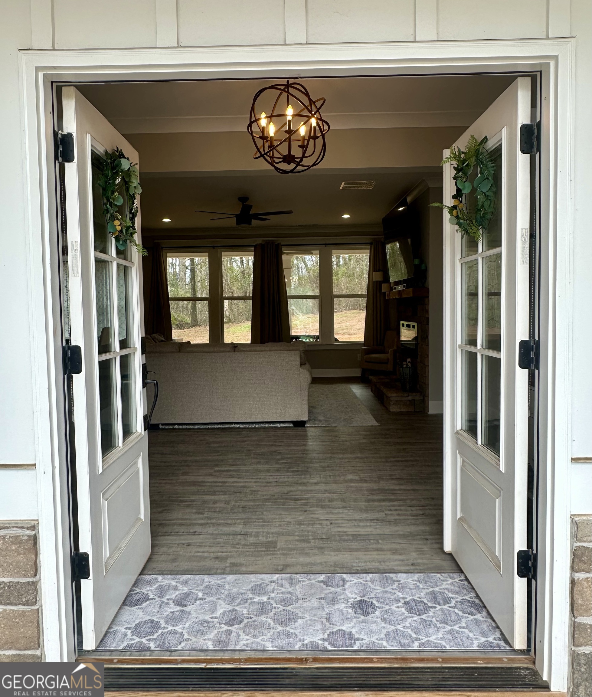 506 Summit View Drive Jefferson, GA 30549 - Photo 6 of 52 a view of a hallway with a couch and chandelier