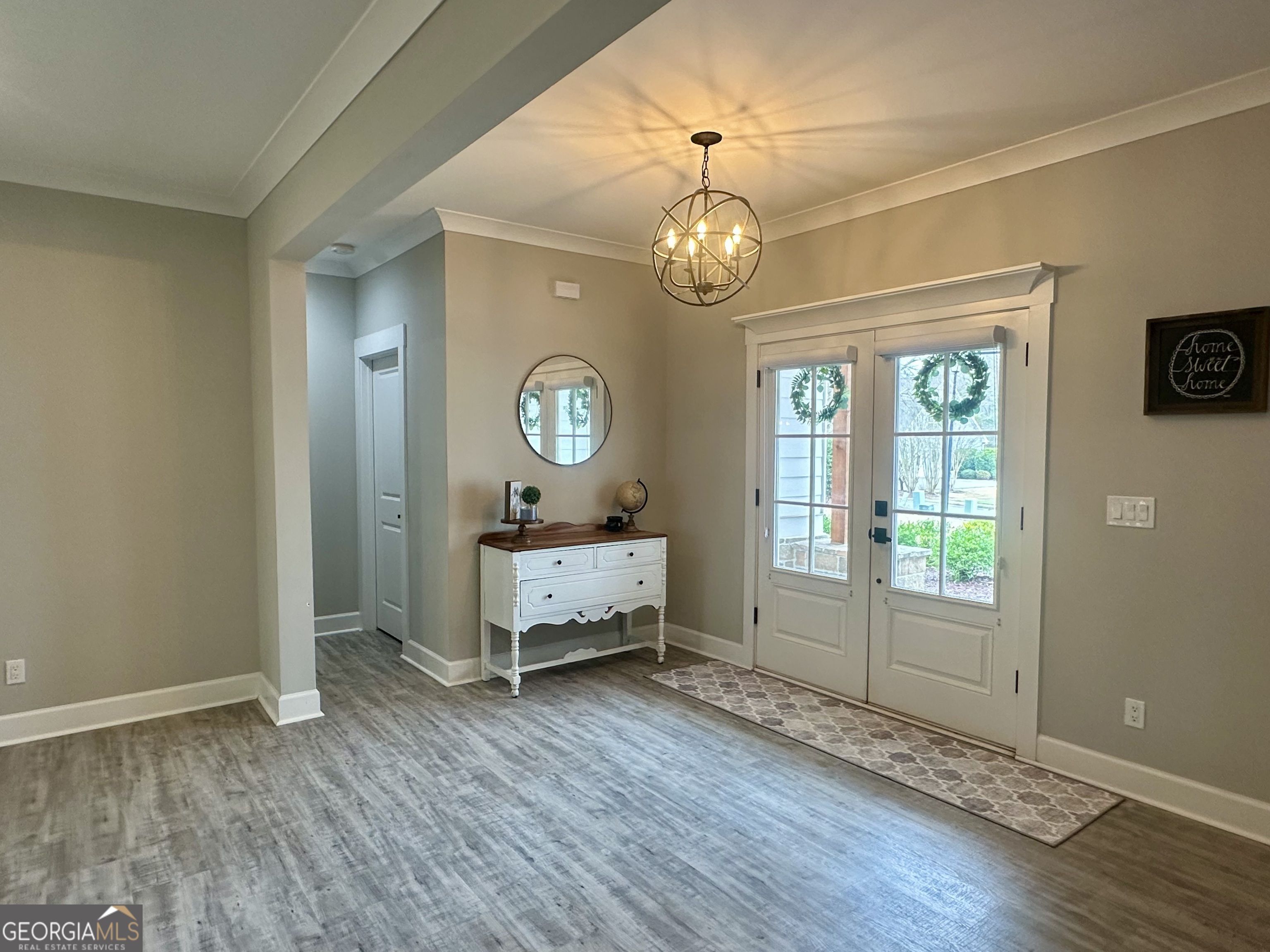 506 Summit View Drive Jefferson, GA 30549 - Photo 10 of 52 an empty room with wooden floor and windows