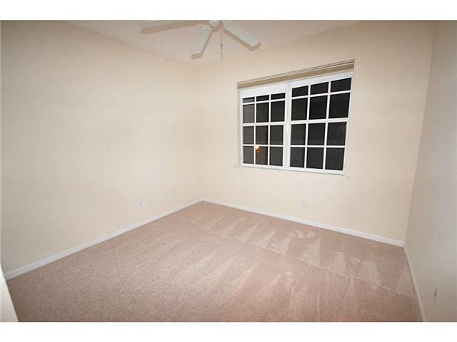 415 Southwest Walking Path Stuart, FL 34997 - Photo 12 of 16 a view of empty room with windows
