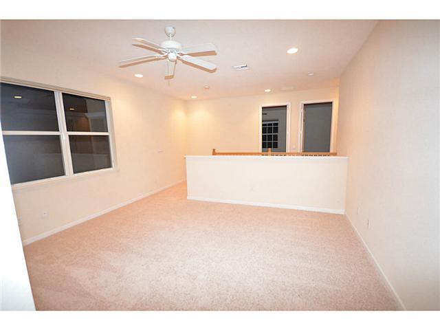 415 Southwest Walking Path Stuart, FL 34997 - Photo 9 of 16 a view of an empty room with a window