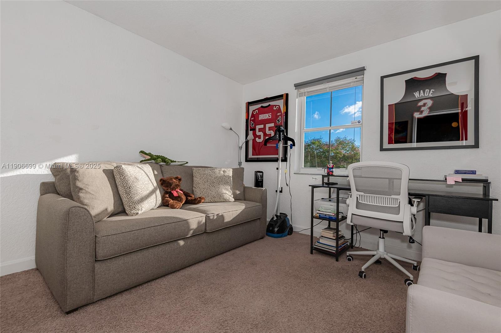 3816 Southwest 169th Terrace Miramar, FL 33027 - Photo 14 of 21 a living room with furniture and window