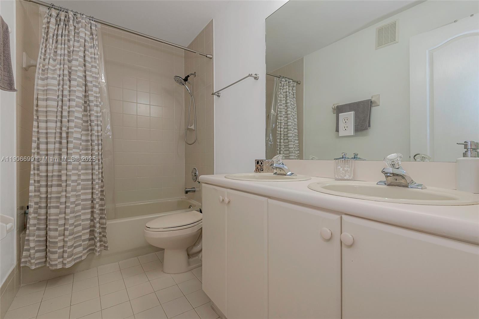 3816 Southwest 169th Terrace Miramar, FL 33027 - Photo 15 of 21 a bathroom with a sink toilet and shower