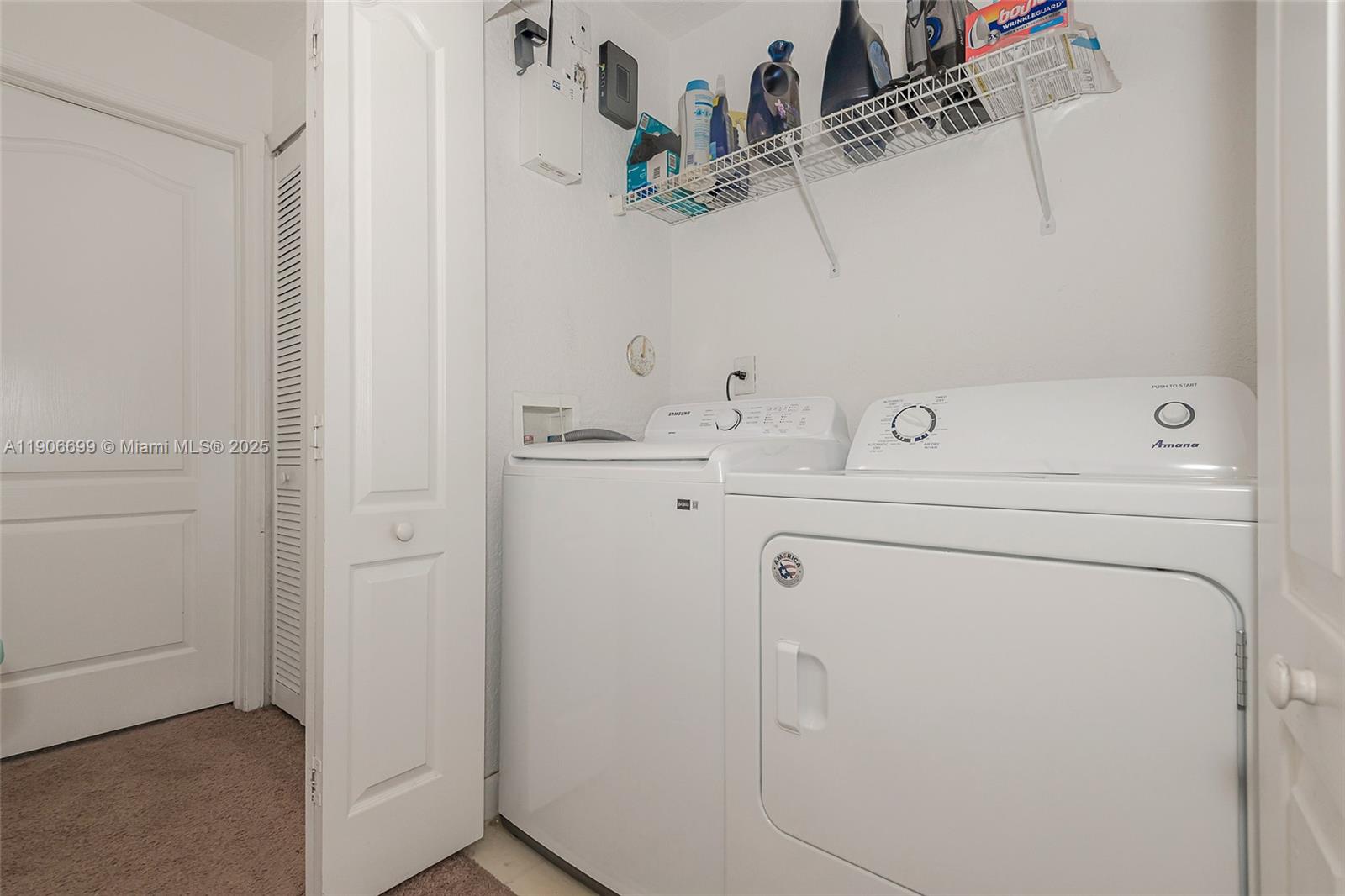 3816 Southwest 169th Terrace Miramar, FL 33027 - Photo 20 of 21 a utility room with dryer and washer