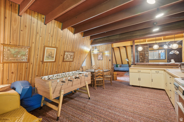 8505 South Snake Crk Road Salt Lake City, UT 84121 - Photo 19 of 67 Sloped wood panel walls with exposed ceiling beams and recessed lighting