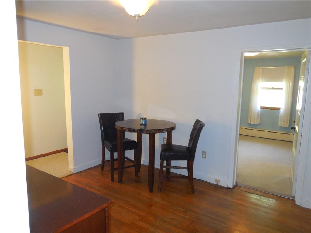 609 Sycamore Rd Extension Sewickley, PA 15143 - Photo 21 of 21 The dining room/den leads to 3rd bedroom and back 2 bedrooms and full bath or easy access to back door.