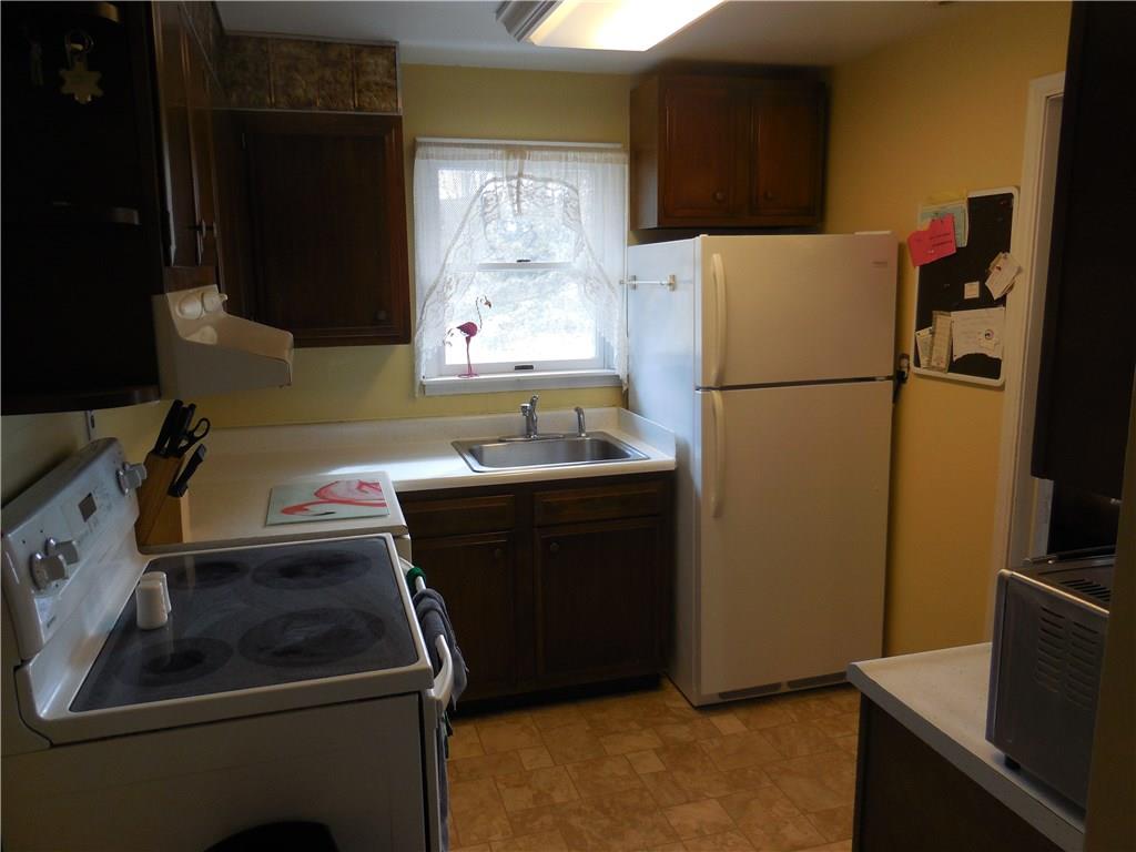 609 Sycamore Rd Extension Sewickley, PA 15143 - Photo 7 of 21 Cozy kitchen has a pantry.