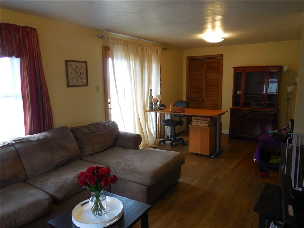 609 Sycamore Rd Extension Sewickley, PA 15143 - Photo 10 of 21 Living room/office has plenty of room for the whole family.