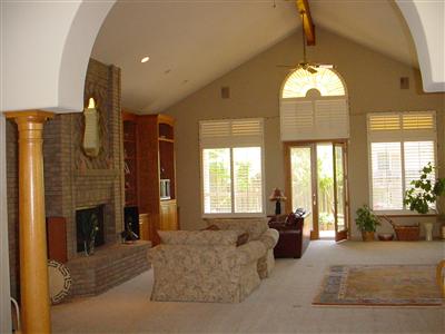 2036 Goldfield Lane Santa Rosa, CA 95403 - Photo 1 of 12 a living room with furniture windows and a chandelier