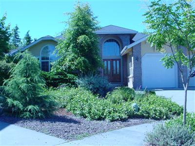 2036 Goldfield Lane Santa Rosa, CA 95403 - Photo 2 of 12 a view of a house with a yard plants and large tree