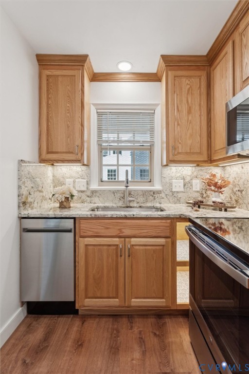 421 Scotland Street, Unit 3 Williamsburg, VA 23185 - Photo 8 of 26 a kitchen with granite countertop cabinets stainless steel appliances and a sink