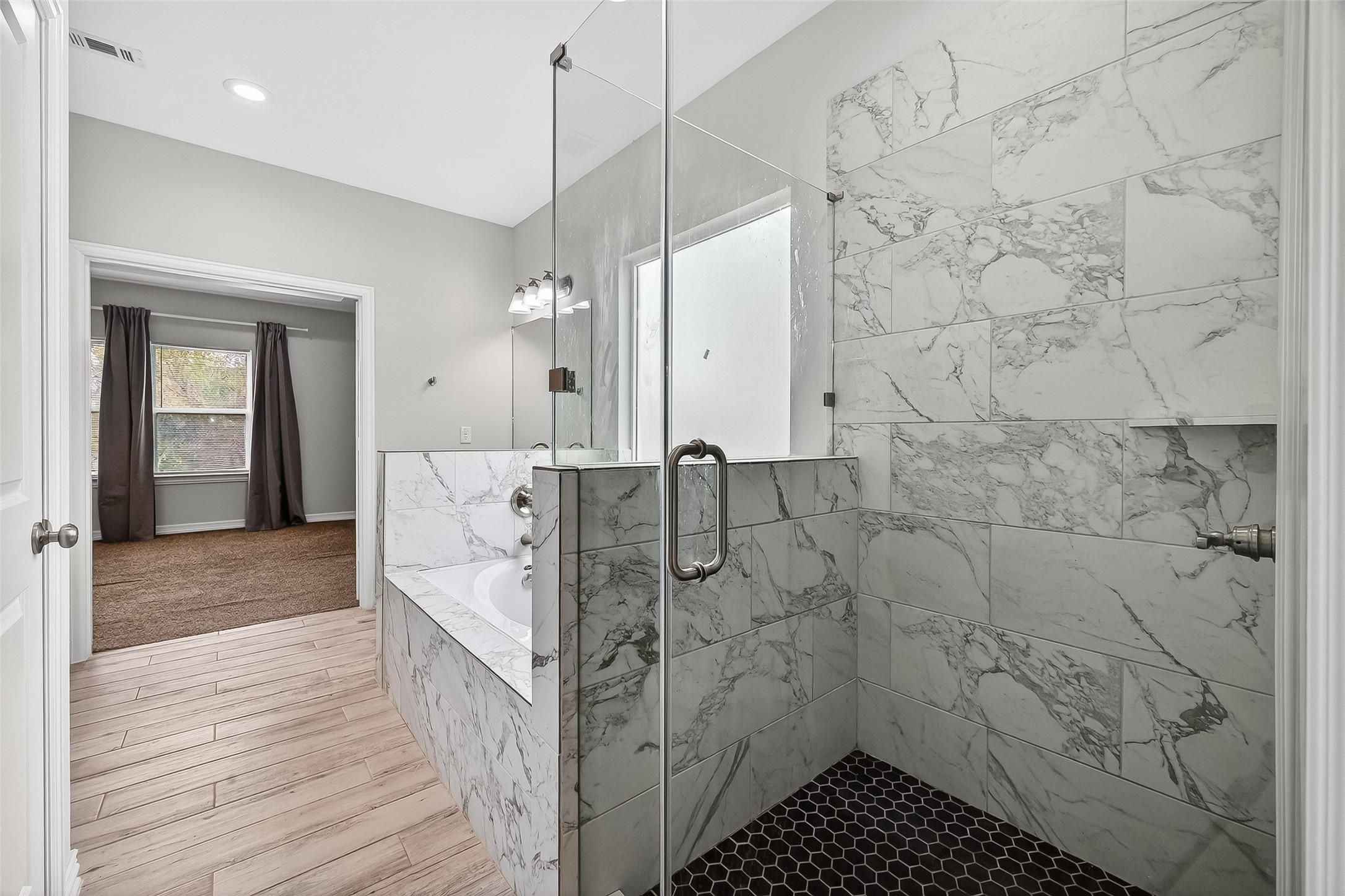 1411 Featherstone Street, Unit B Houston, TX 77020 - Photo 22 of 32 a bathroom with a shower