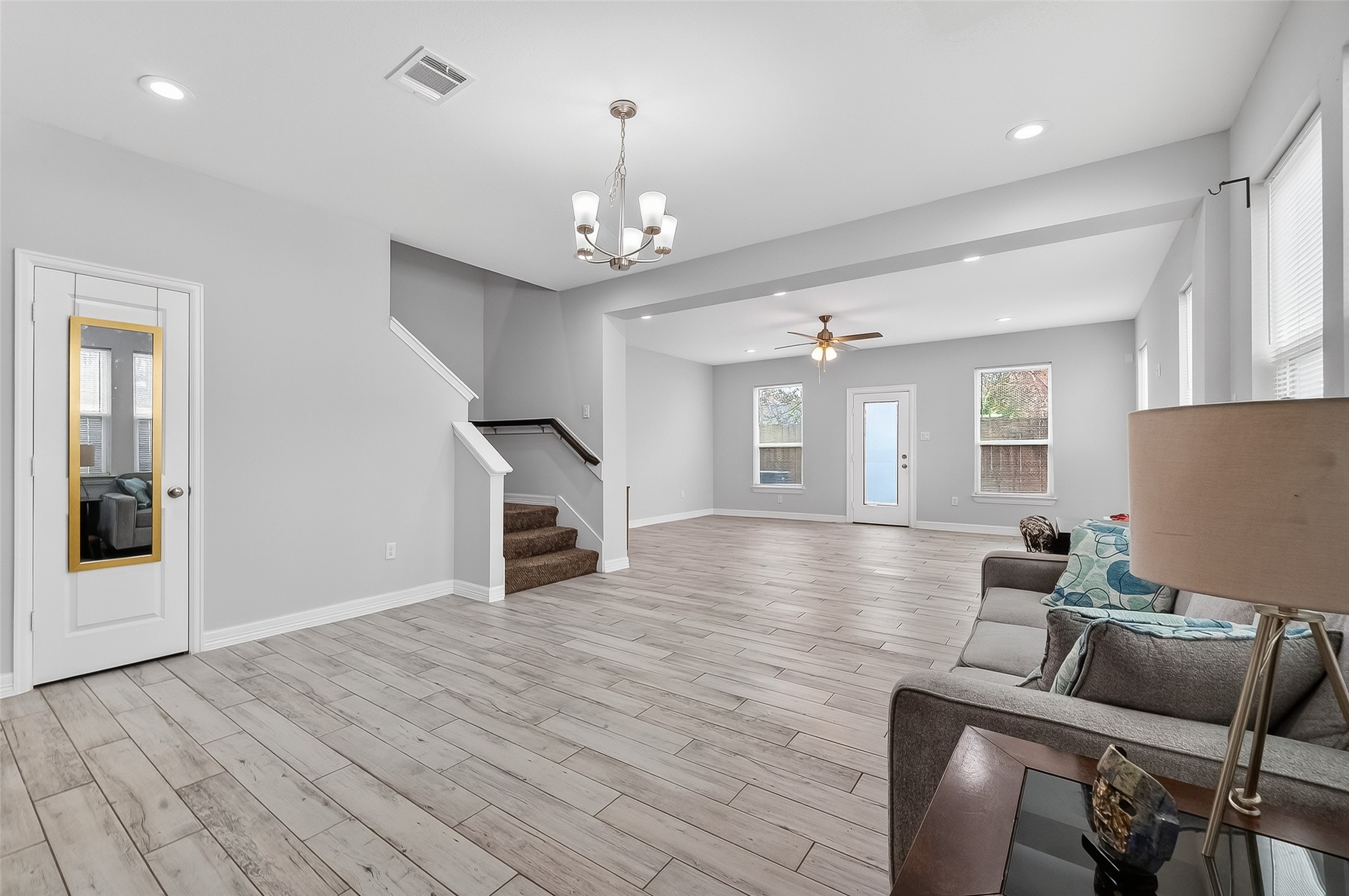 1411 Featherstone Street, Unit B Houston, TX 77020 - Photo 8 of 32 a view of a livingroom with furniture and wooden floor