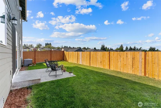 a view of a lake with a yard