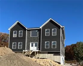 a picture of a living room with furniture