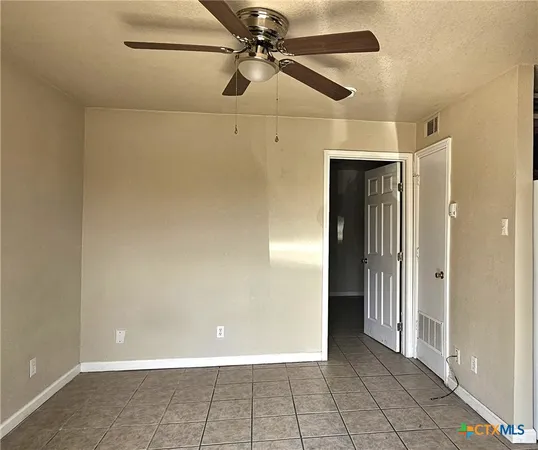 a view of a hallway with a glass door