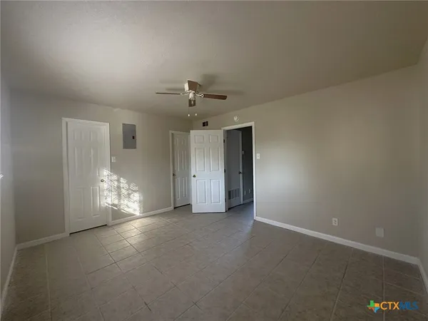 a view of a hallway with natural light