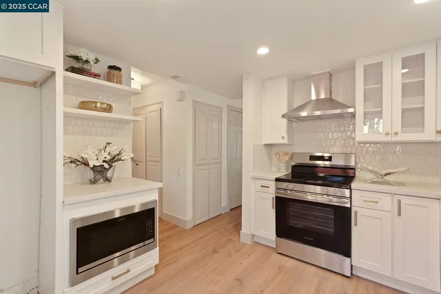 a bathroom with a toilet a sink and a mirror
