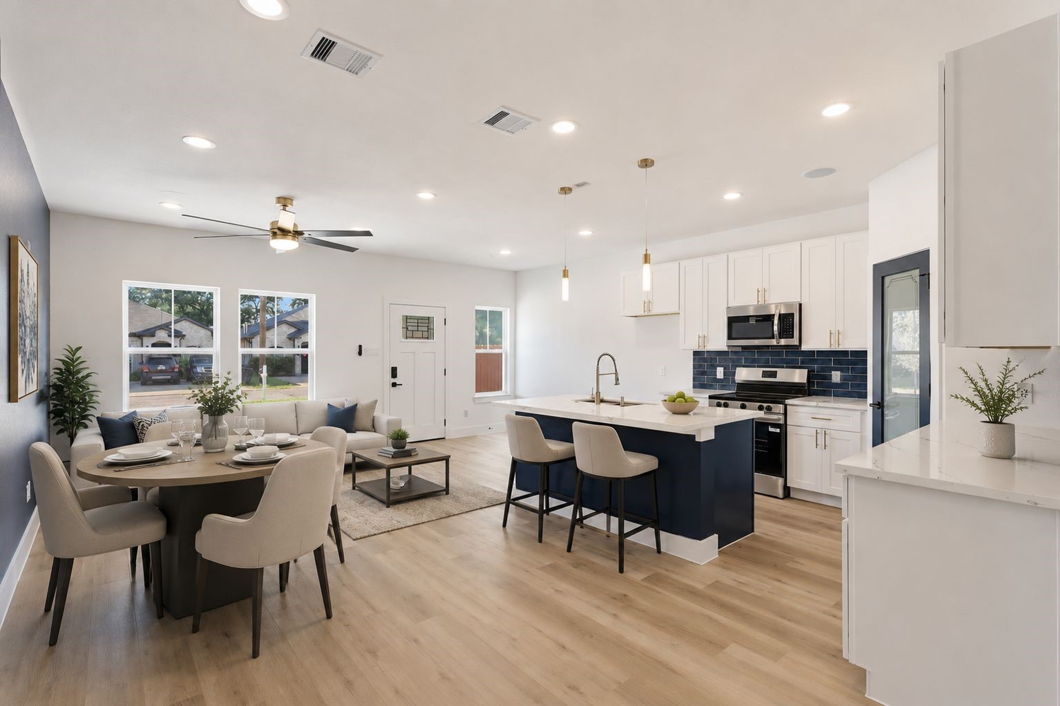 4606 Mallow Street, Unit B Houston, TX 77051 - Photo 25 of 25 a large kitchen with a table and chairs