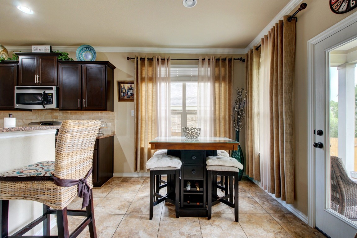 2004 Autumn Run Lane Round Rock, TX 78665 - Photo 11 of 35 a dining room with furniture and window
