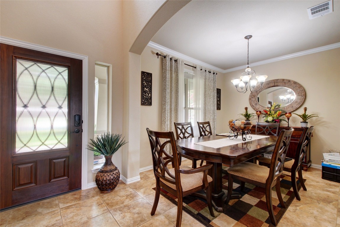 2004 Autumn Run Lane Round Rock, TX 78665 - Photo 13 of 35 a view of a dining room with furniture and window