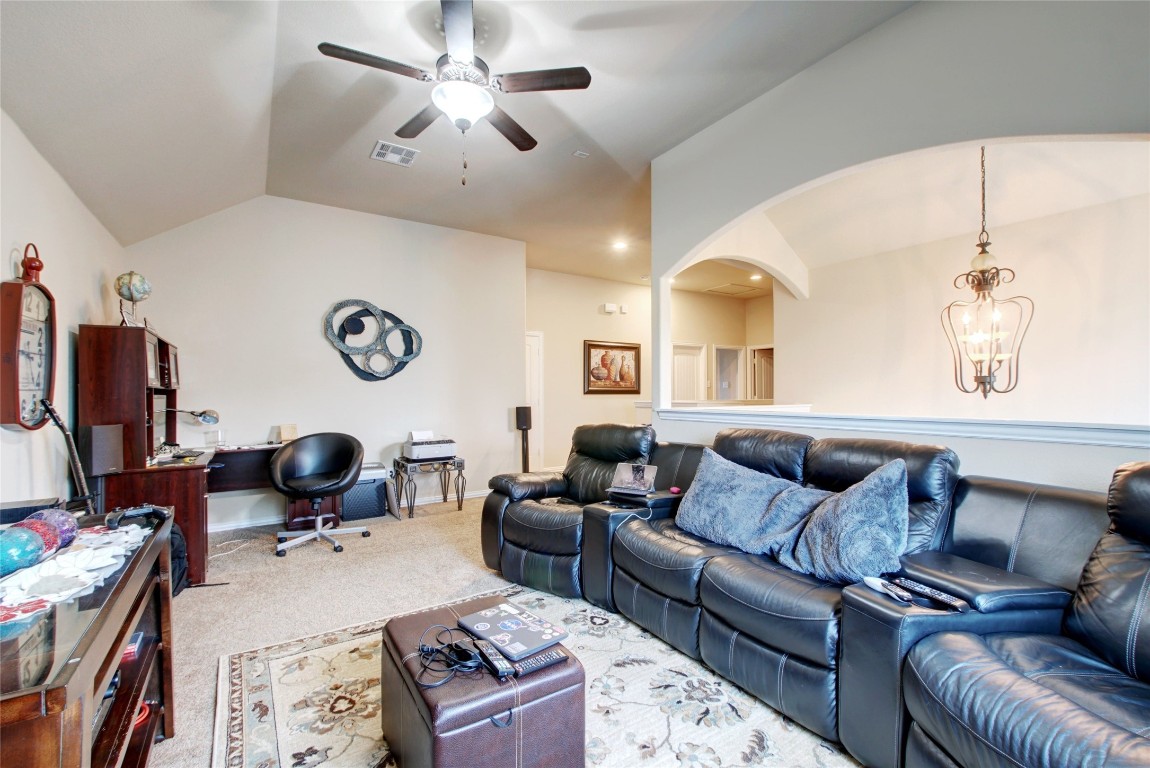 2004 Autumn Run Lane Round Rock, TX 78665 - Photo 18 of 35 a living room with furniture and a flat screen tv