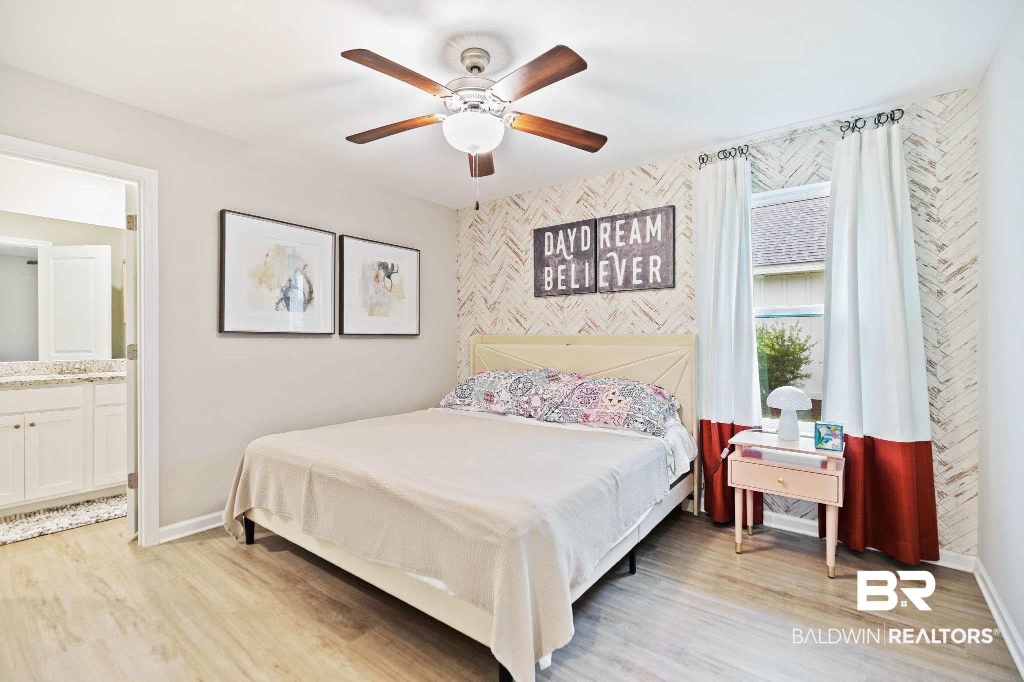 1271 Caper Avenue Foley, AL 36535 - Photo 23 of 29 Bedroom with ceiling fan, connected bathroom, and light hardwood / wood-style floors