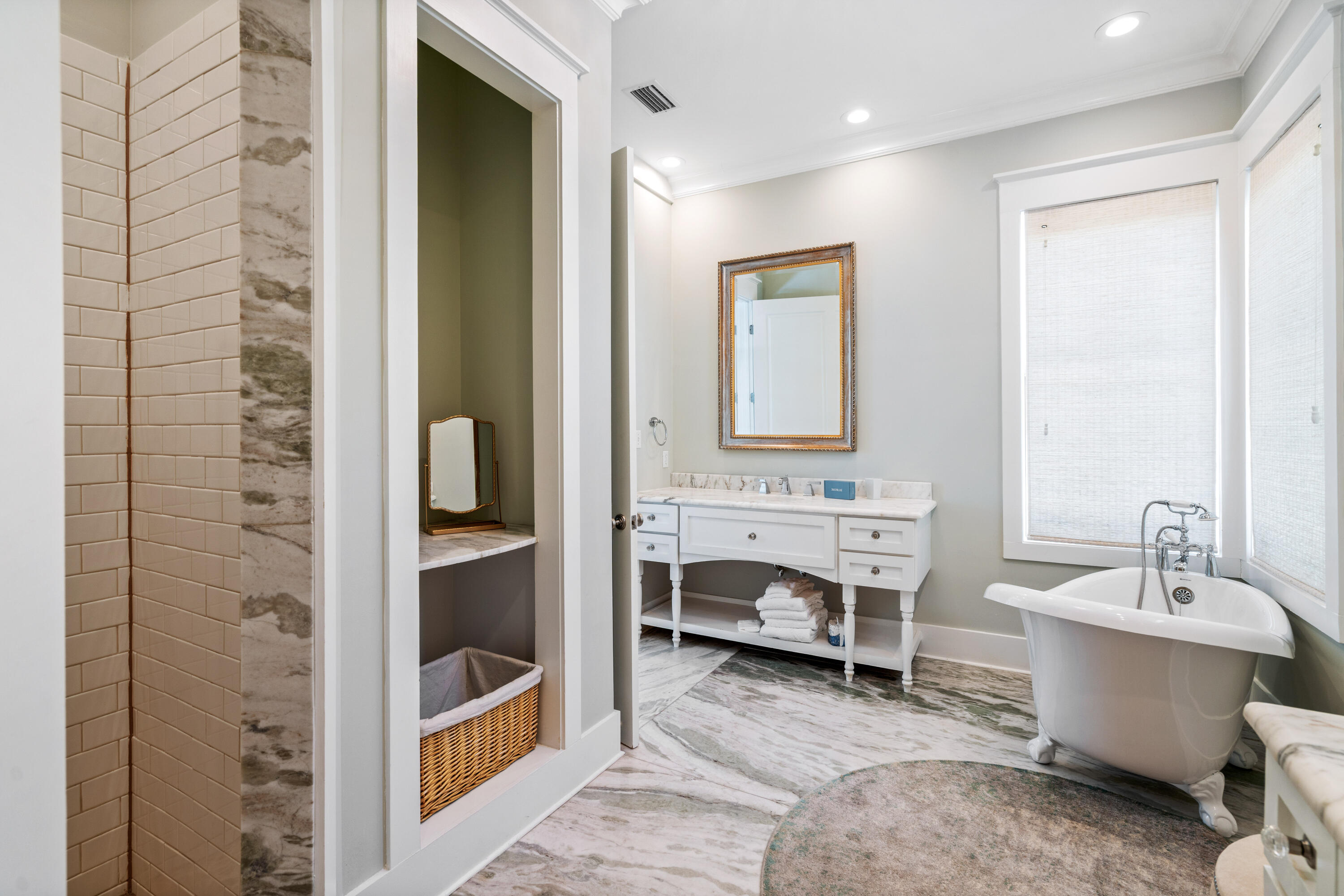 148 Coopersmith Lane Inlet Beach, FL 32461 - Photo 21 of 82 a bathroom with a sink a mirror and a bathtub