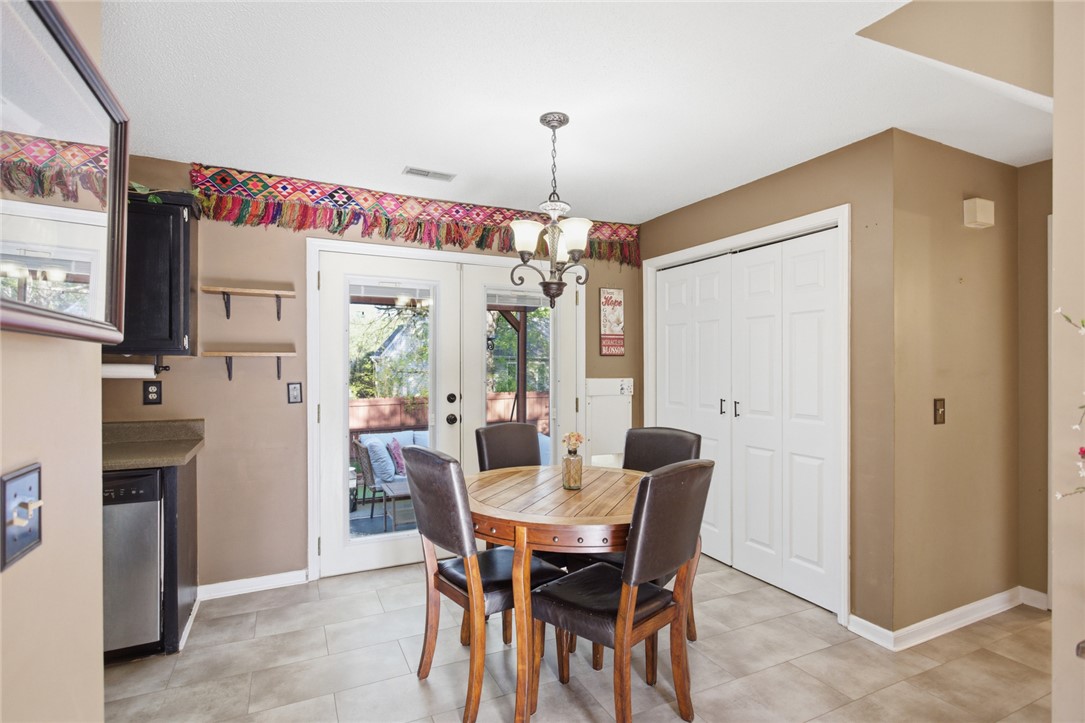 100 Henry Court Central, SC 29630 - Photo 13 of 39 This inviting dining area features a warm ambiance, perfect for casual meals and gathering.