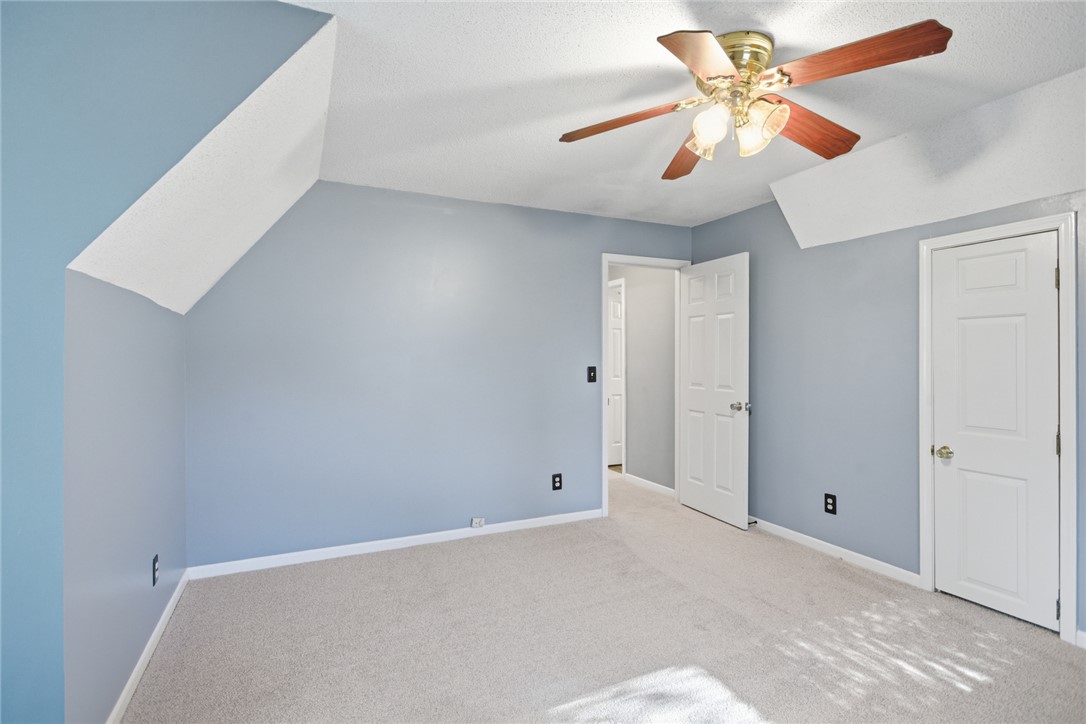 100 Henry Court Central, SC 29630 - Photo 25 of 39 This spacious bedroom offers ample natural light and a comfortable atmosphere for rest and relaxation.