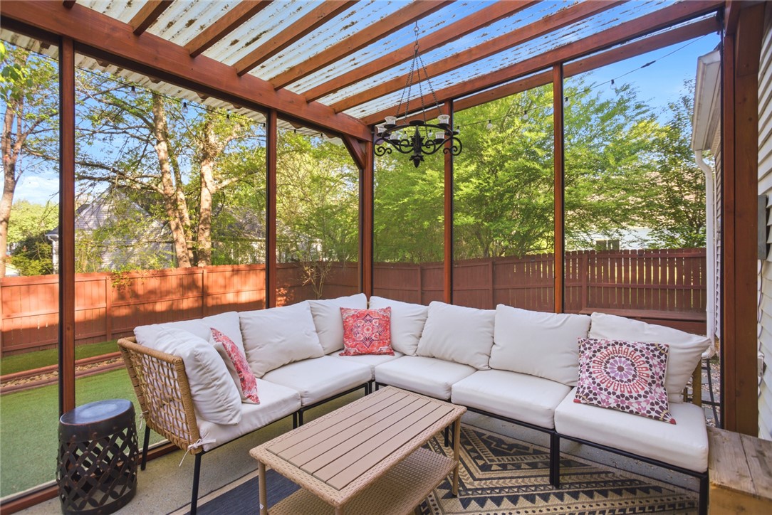 100 Henry Court Central, SC 29630 - Photo 28 of 39 Enjoy outdoor living in this bright screened-in porch, perfect for relaxing.