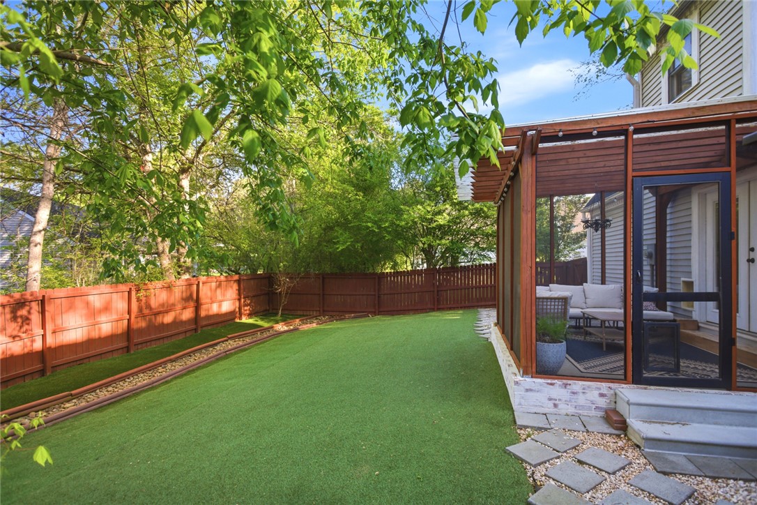 100 Henry Court Central, SC 29630 - Photo 30 of 39 This spacious private yard features a screened patio, perfect for outdoor enjoyment and relaxation.