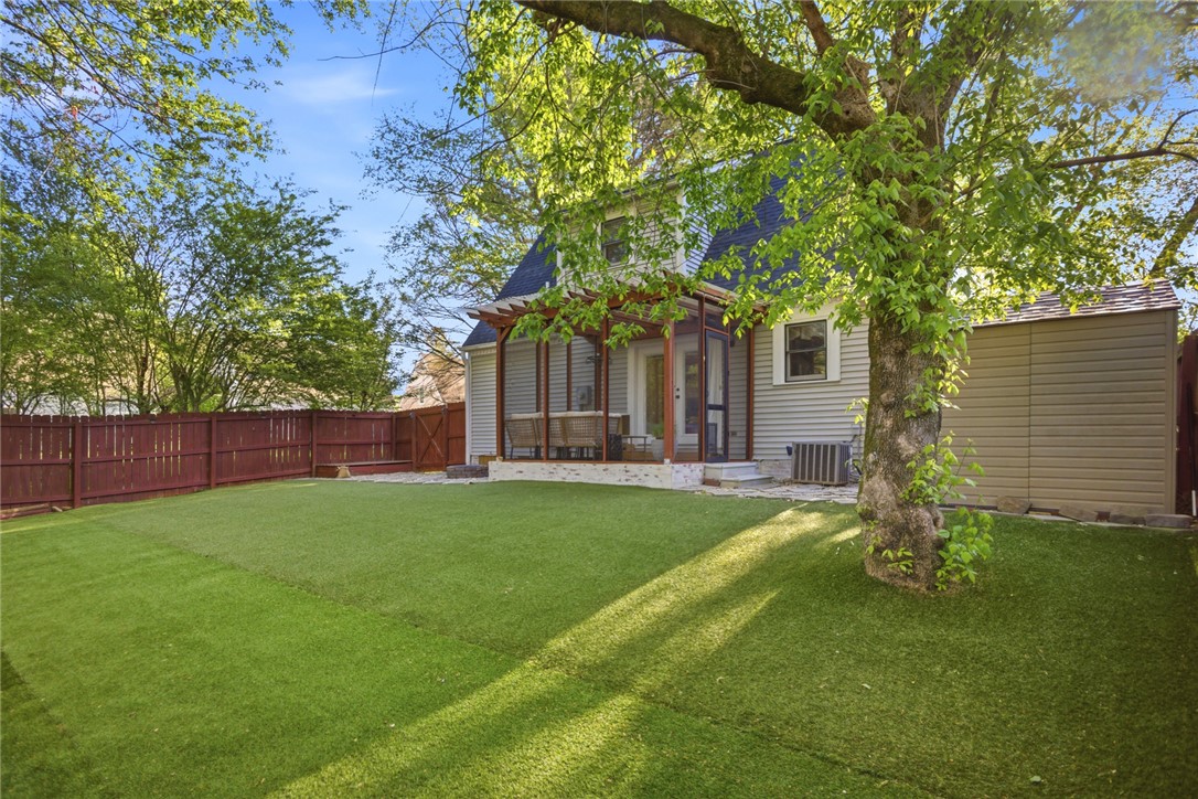 100 Henry Court Central, SC 29630 - Photo 31 of 39 This private yard offers lush turf and a screened-in porch, perfect for enjoying outdoor living.