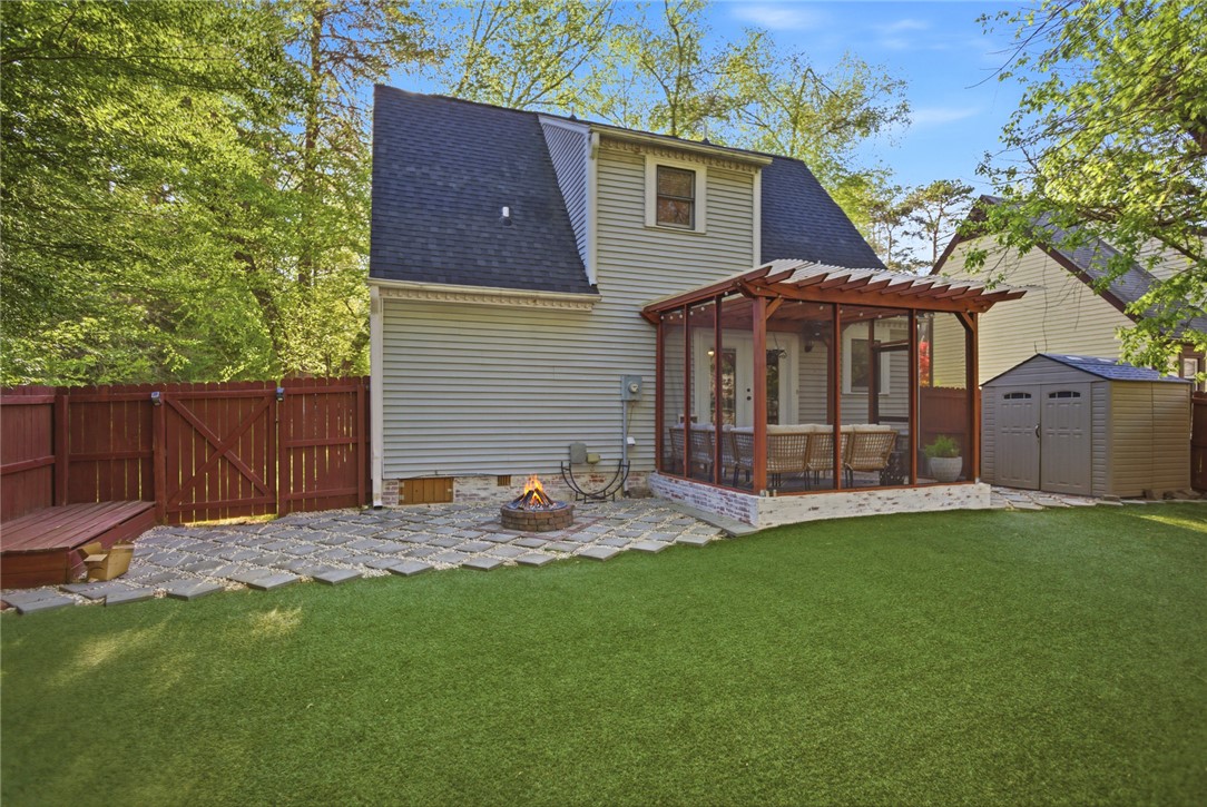 100 Henry Court Central, SC 29630 - Photo 34 of 39 This charming home offers a private yard with a cozy patio and inviting fire pit.