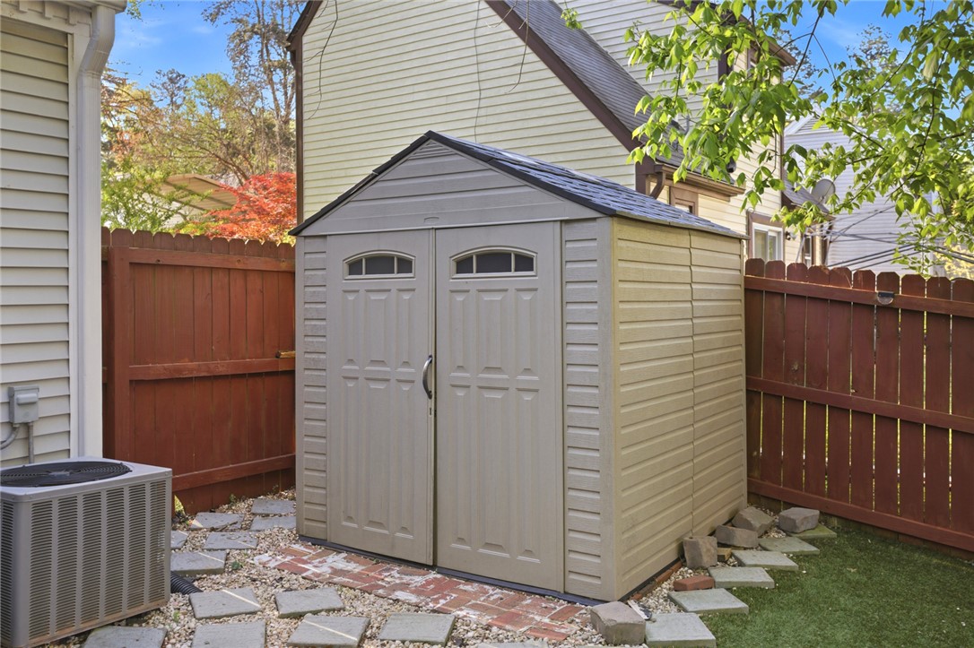 100 Henry Court Central, SC 29630 - Photo 37 of 39 This yard offers a functional storage shed and privacy fencing.