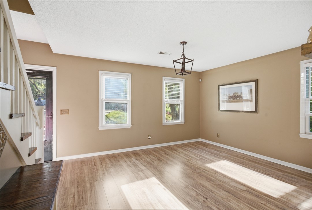 100 Henry Court Central, SC 29630 - Photo 6 of 39 This inviting space features elegant flooring and abundant natural light, creating a bright atmosphere.