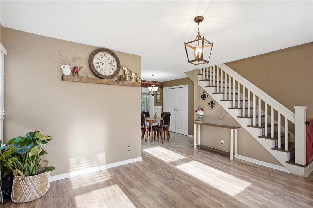 100 Henry Court Central, SC 29630 - Photo 7 of 39 This inviting interior features a staircase and dining area, ready for comfortable living.