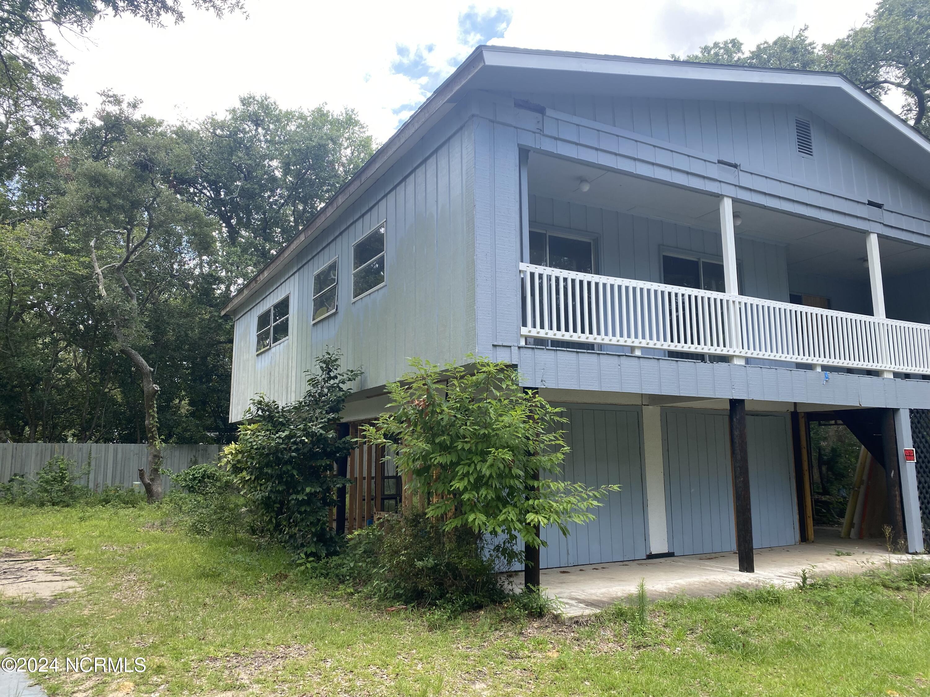 116 Southwest 6th Street Oak Island, NC 28465 - Photo 2 of 5 IMG_9145