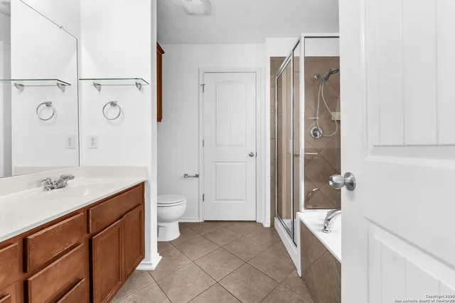 a bathroom with a bathtub and a sink