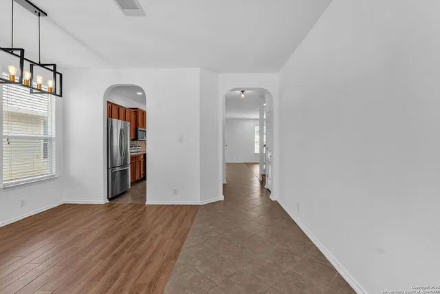 a view of a kitchen with marble kitchen and a window