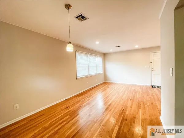 a view of an empty room and window