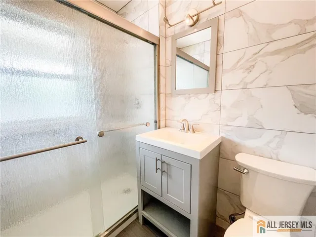 a bathroom with a sink and a toilet
