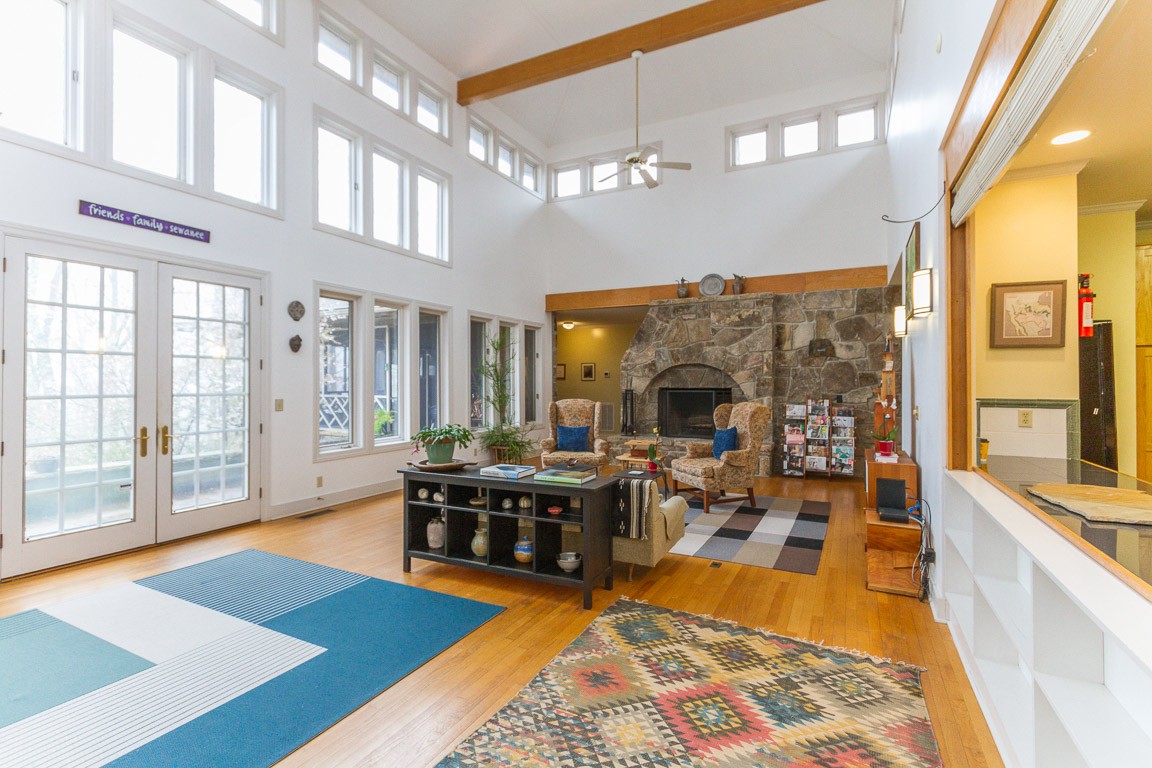 1033 Eva Lake Road Sewanee, TN 37375 - Photo 14 of 49 a living room with furniture rug and a table