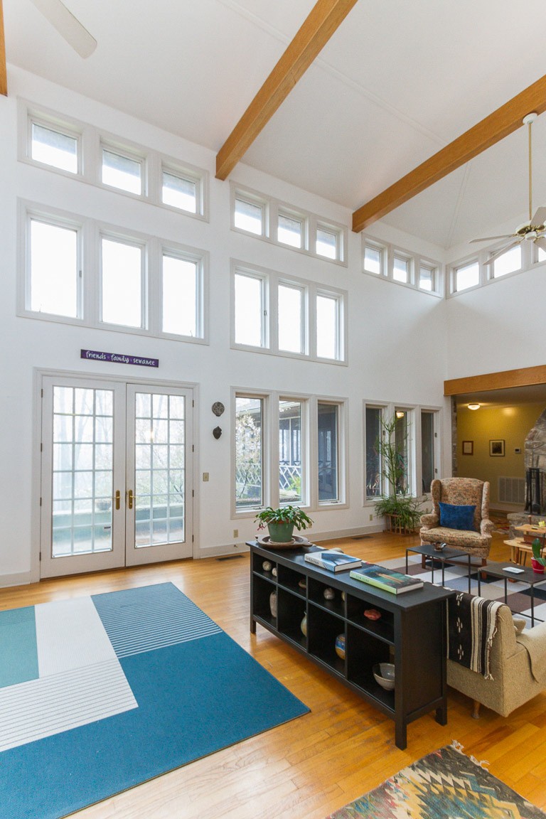 1033 Eva Lake Road Sewanee, TN 37375 - Photo 15 of 49 a living room with kitchen appliances and a large window