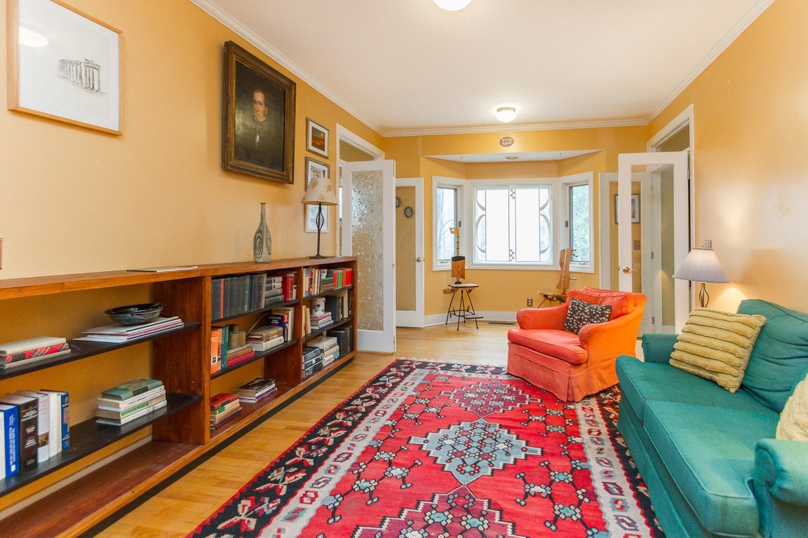 1033 Eva Lake Road Sewanee, TN 37375 - Photo 25 of 49 a bedroom with furniture and a book shelf