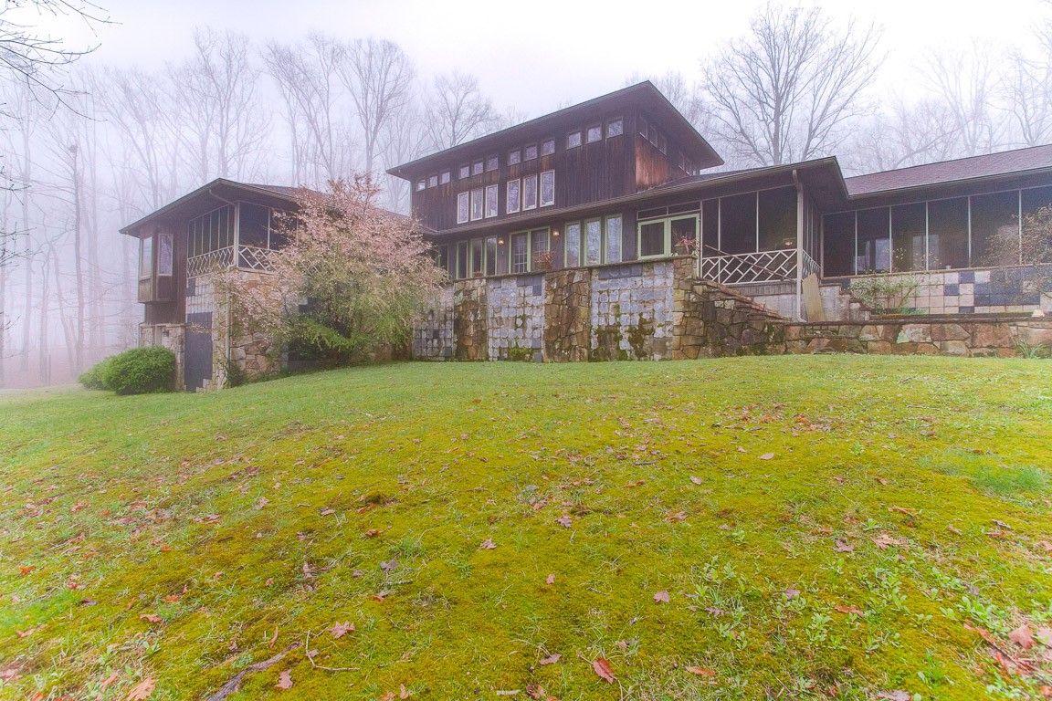 1033 Eva Lake Road Sewanee, TN 37375 - Photo 45 of 49 a view of a house with a yard