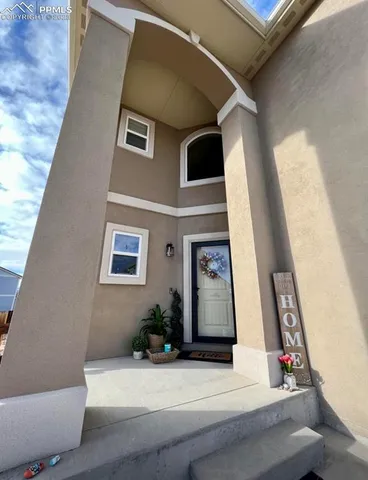 a view of a car parked in front of a building