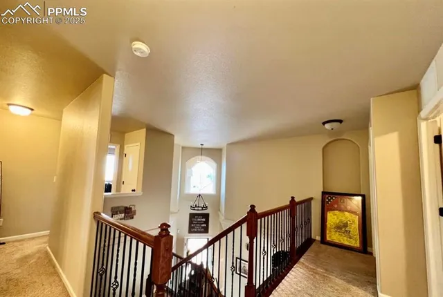 a view of a swimming pool with an outdoor seating