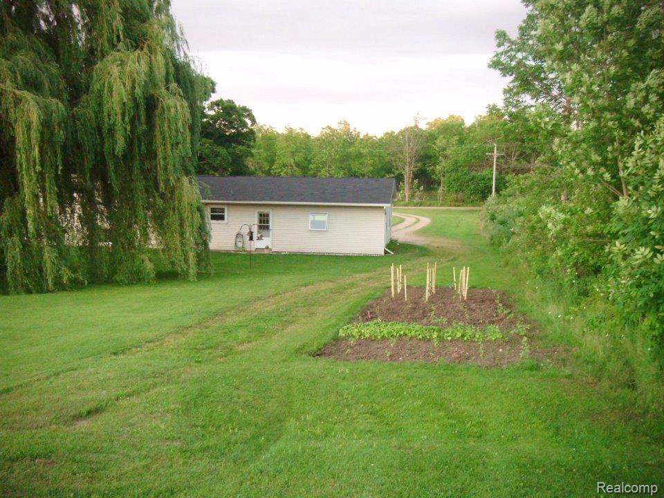 3148 Bohlman Road Dryden, MI 48428 - Photo 2 of 17 garden - summer.jpg
